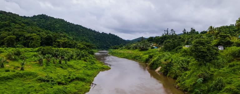 Aerial view of Naveiveiwali village and Wainibuka river and riverbank.