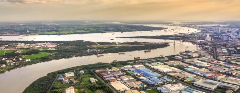 View of the special economic zone of Ho Chi Minh City, with industrial buildings and the Saigon River 