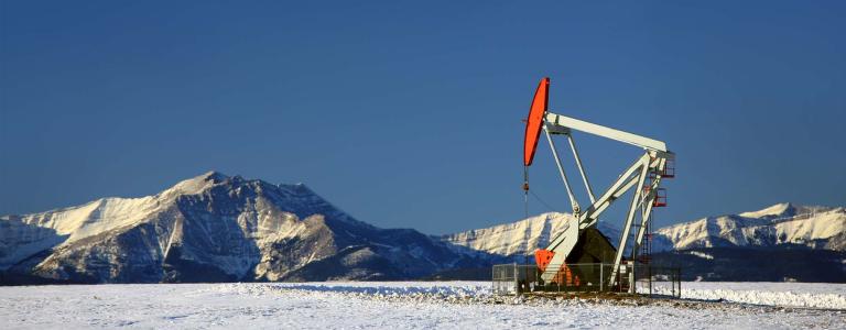 oil pumpjack in winter