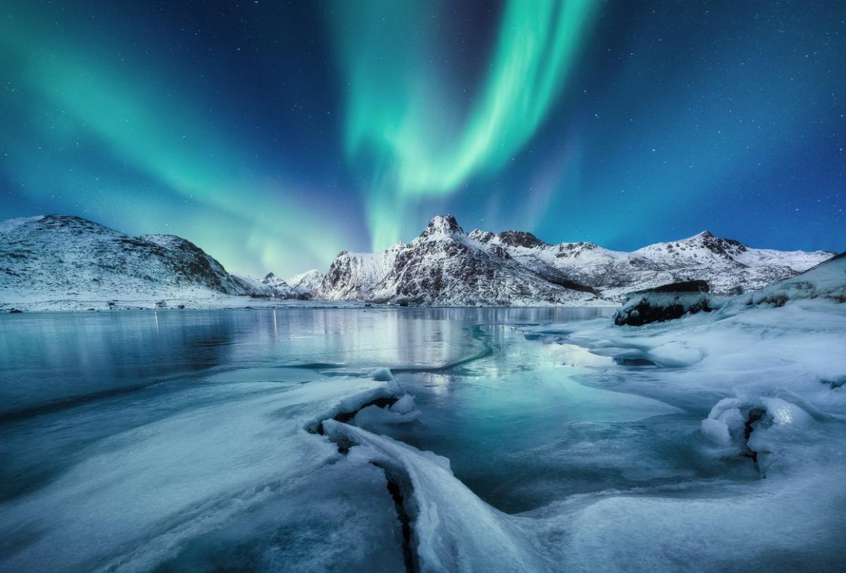 A breathtaking display of shimmering Northern Lights illuminating the Arctic  landscape with a serene background perfect for adding text 28596686 Stock  Photo at Vecteezy