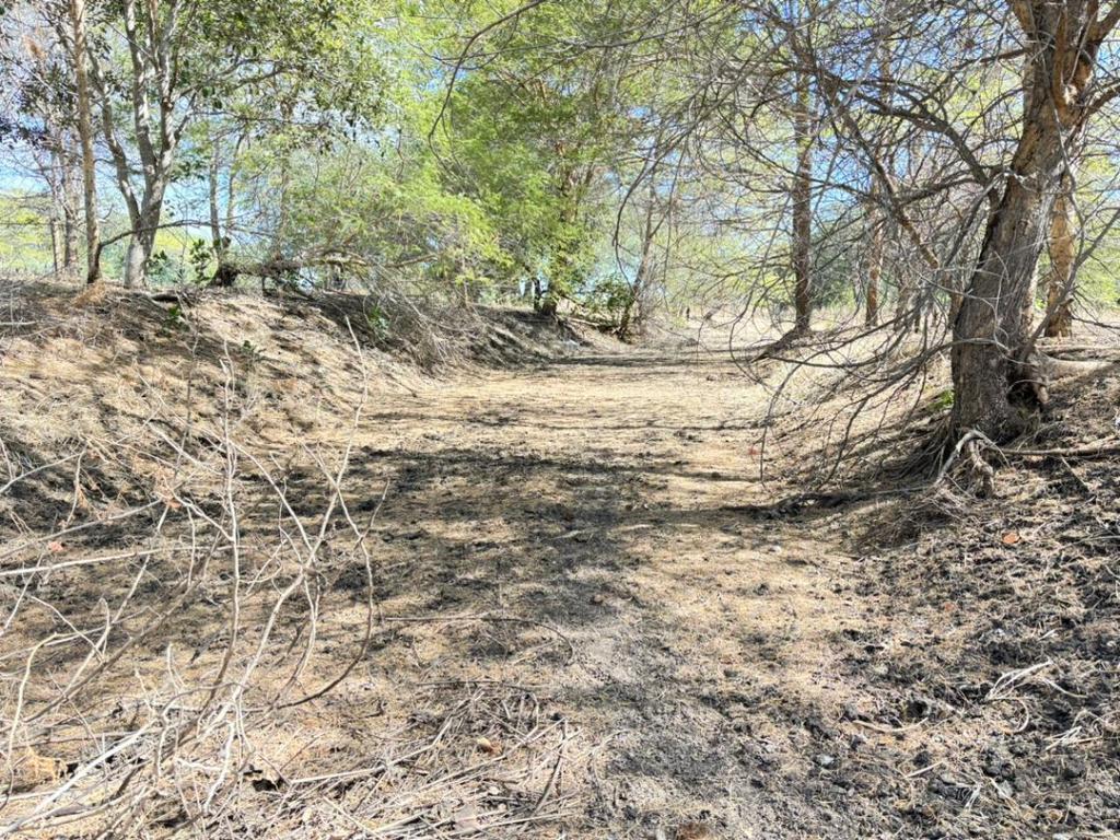 The Nsongwe River currently stands mostly dry