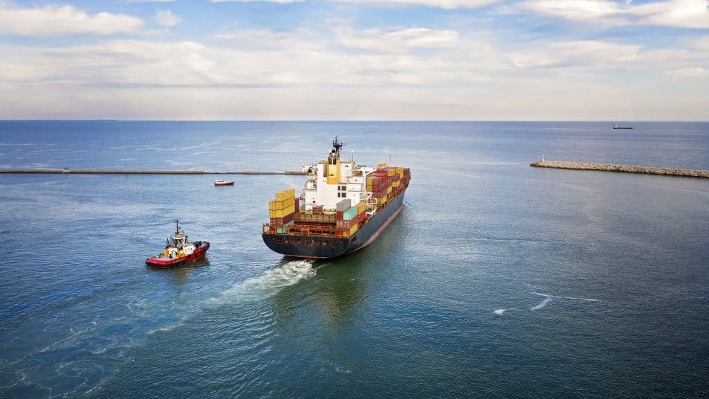 Container ship vessel cargo carrier in transit.